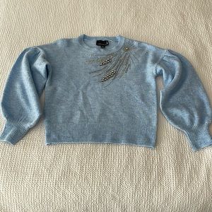 Blue sweater with bling